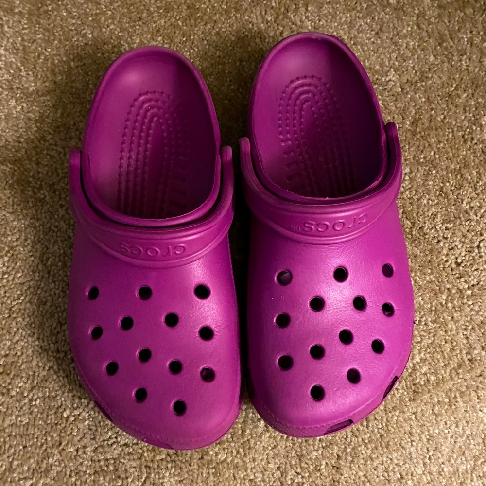 Purple crocs.